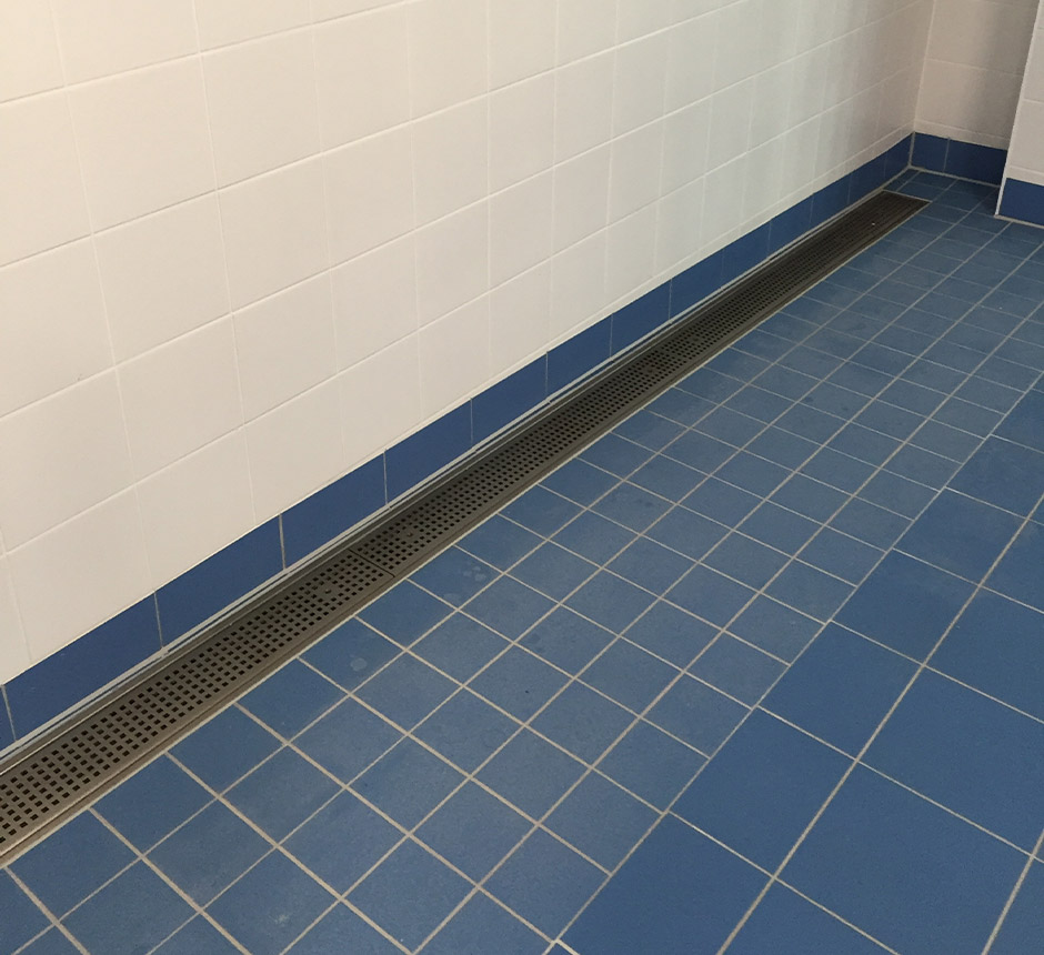 Kents commercial drain channel in use in a wetroom