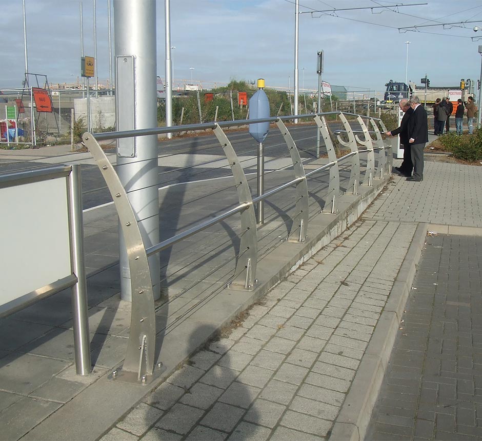 Side angle view of Kents light rail balustrade curved on a street