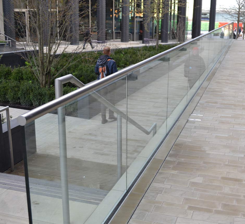 Side angle view of Kents glazed balustrade with glass infill