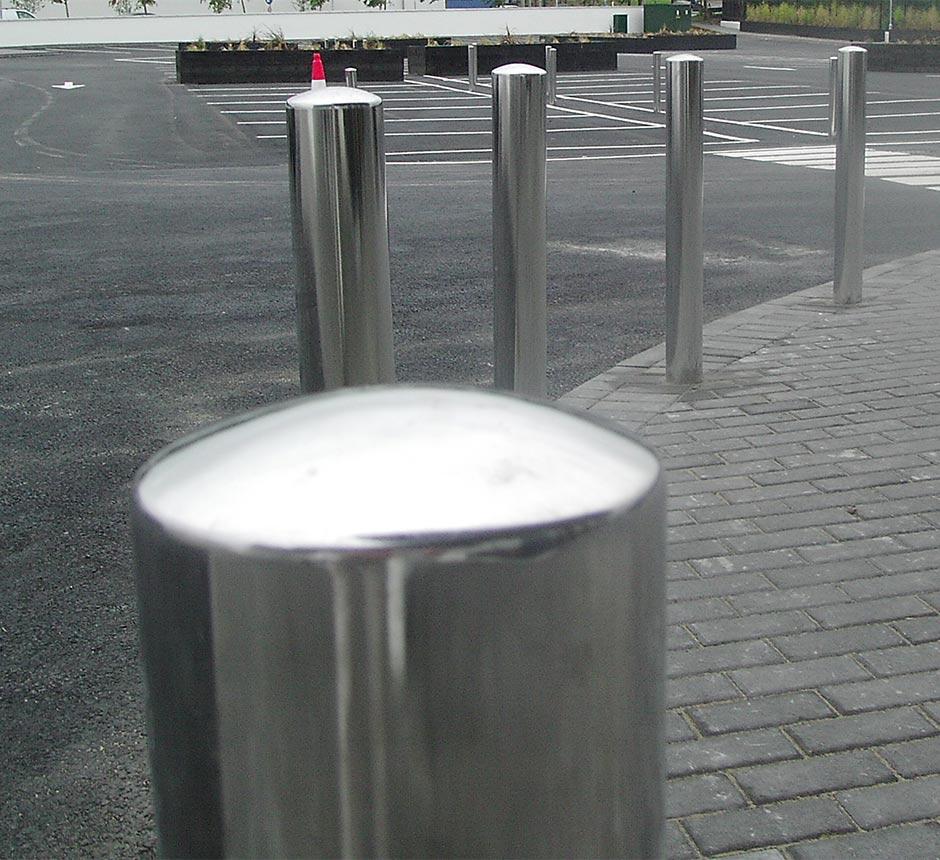 Close up of Kents bollards with a dome top on a street