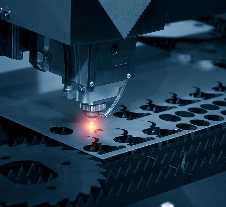 A factory machine performing laser cutting